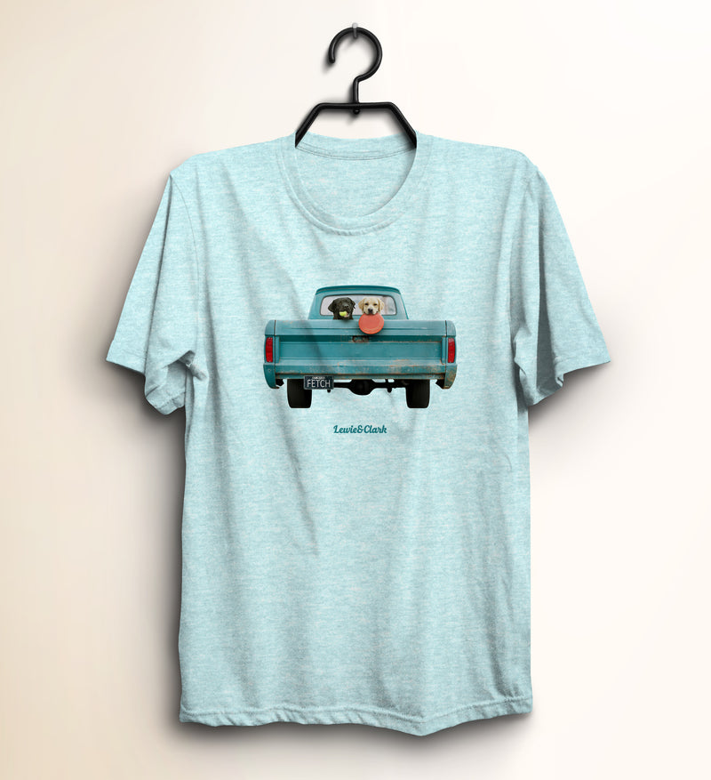 Dogs in pick up truck - Dog lovers - meet your new favorite tee! This unisex t-shirt is lightweight and soft with just the right amount of stretch. It's comfortable and flattering for all. It's our favorite kind of tee, and it's sure to be your favorite too!  